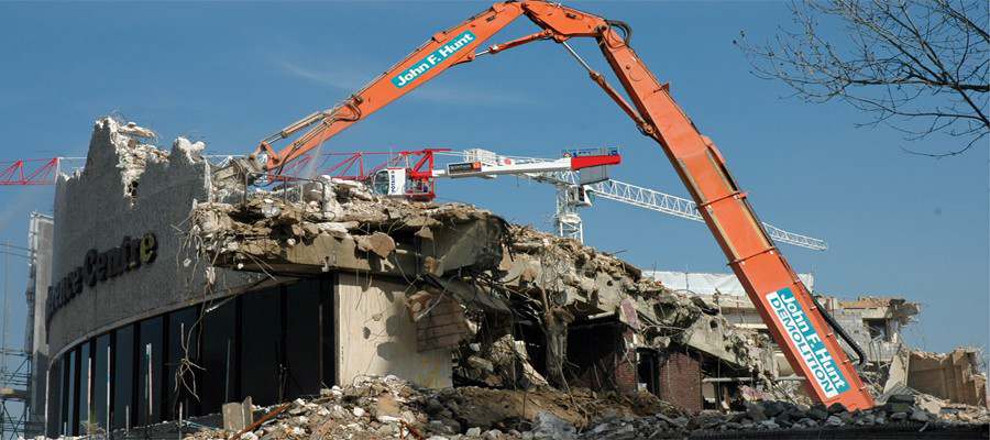 Wembley Conference Centre, Elvin House & Exhibition Halls - close up of long reach excavator during demolition