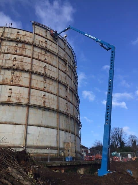 Oxted gas progress - high reach excavator in use during demoliton