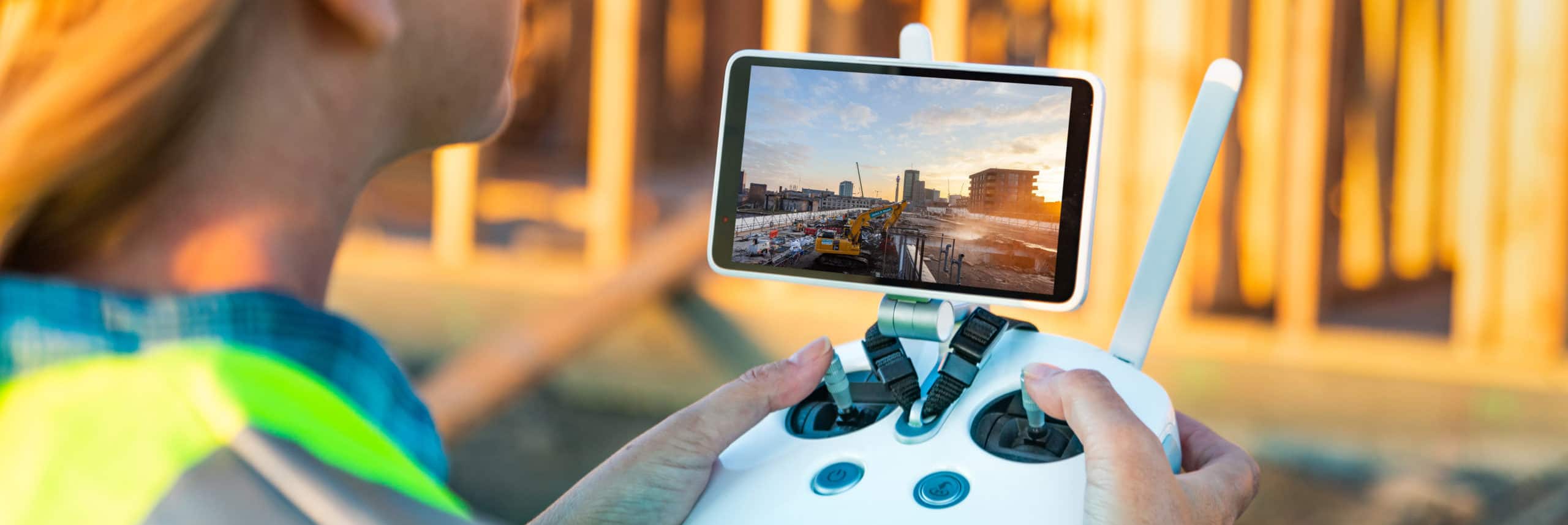 Istock image of drone screen - remote being used by construction worker